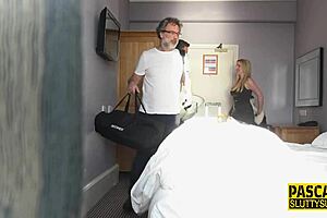 The submissive babe in a real fetish scene gets fingered while deepthroating her partner.