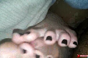 couple does footjob on webcam