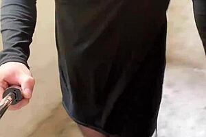 girl in crossdressing outfit exposes herself in office hallway