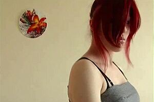 Young slickmill girl exposes her tits and wet split in home video