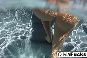 Blonde Olivia Enjoys Underwater Relaxation