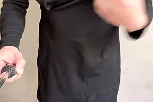 girl in crossdressing outfit exposes herself in office hallway