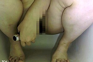 asian girl masturbates pussy in self-shot video