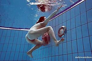 Sexy Italian Martina Seduces in Underwater Scene