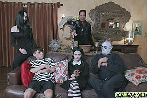 the addams family gets down and dirty around the old haunted mansion