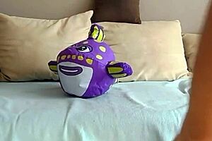 Sophie smoking and playing with a balloon