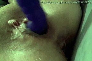 She squirts massively with her dildo.