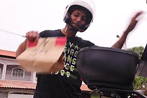 Young Delivery Girl Sits on Driver's Lap