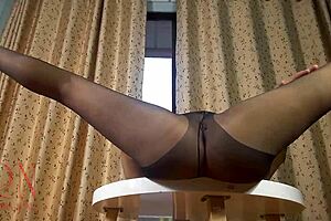 nice lady in pantyhose and heels striptease at the round table c3