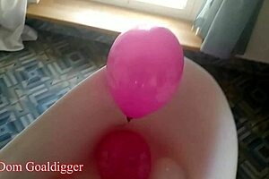 Balloons and Stockings Mesmerize in Bathroom Fetish