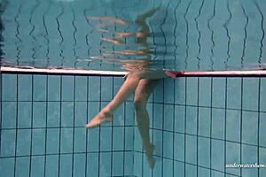 Slutty Teen Swims and Strips Underwater