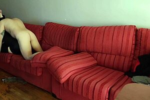 A woman in black leggings gets anal in the living room.