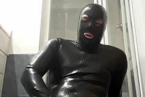 feeling the latex grip during intense gay wanking session