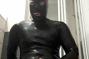 feeling the latex grip during intense gay wanking session