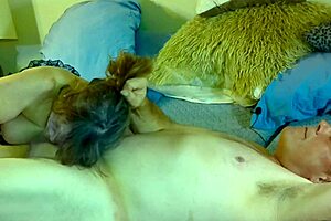 HD video of a married lady dressed a green colour corset performing blowjob
