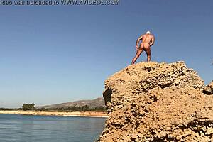 Exhibitionist Flashes Boldly at Nudist Beach