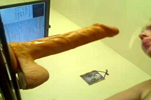 Blonde deep throats huge dildo 😍