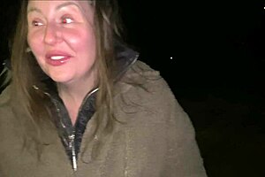 a street girl flashes passersby in the public outdoor area