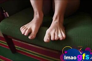 Blonde teen licks toes in close-up fetish