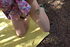 in the forest, a woman with big tits and hairy pussy risks masturbating to orgasm in public