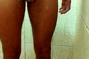 Young Well-Endowed Guy Showcases His Dick In The Shower