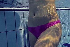 I admire the absolute underwater blonde beauty Elena Proklova in the pool. Her tattoos and natural tits shine beautifully.