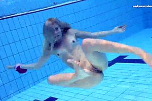 I admire the absolute underwater blonde beauty Elena Proklova in the pool. Her tattoos and natural tits shine beautifully.
