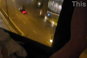 OMG, my girlfriend is fingering her clit in front of the hotel window! 😍