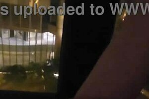 OMG, my girlfriend is fingering her clit in front of the hotel window! 😍