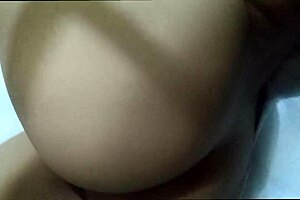 Latin girl masturbating her wet shaved pussy at home.