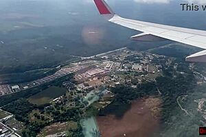 Risky plane blowjob gets caught
