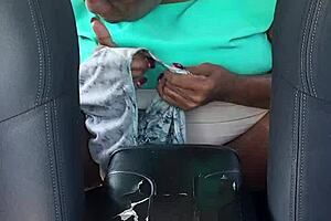 showing my wet pussy in the backseat while bent over