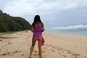 Gloria does no-panties yoga on wild beach with pink butt plug inserted