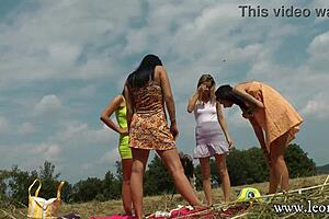 Party Girls Outdoors in Miniskirts and Sun Dresses Play Twister Without Panties