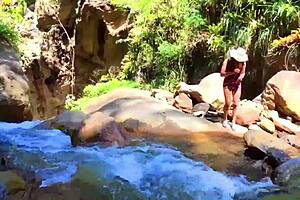 lilyan masturbates by river with dildo