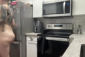 Young 18+ thug twerking in shorts, close up.