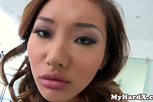 Asian pornstar expertly throats a massive black cock