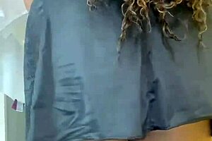 Curvy latina strips in the bathroom