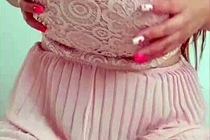 Young student flaunts big tits in pink dress and plays with them! 😍