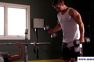 Gym buddy spots jock's cock and starts sucking eagerly.