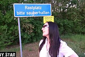 This German girl goes down on him and chokes the pennis in the open place