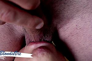 Blonde milf licks balls and strokes big cock.