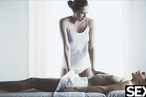 gorgeous lesbian lovers oiled up for sexy naked massage