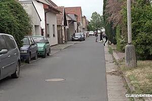 two babes passionately share dildo outdoors