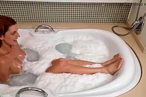 Redhead Sucks Black Cock in Jacuzzi