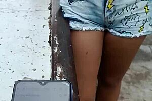 Latina Bends Over Showing Tits and Pussy Publicly