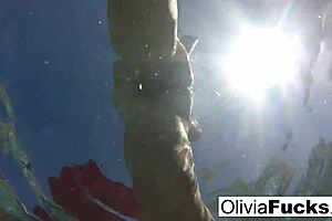 i'm olivia, a blonde milf, enjoying nude masturbation in the pool