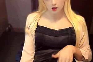 Blonde long-haired ladyboy masturbates intensely!