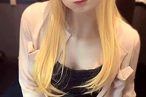 Blonde long-haired ladyboy masturbates intensely!