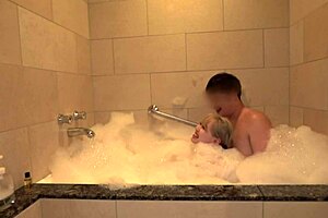 Homemade Asian Gal Squeezes Big Tits